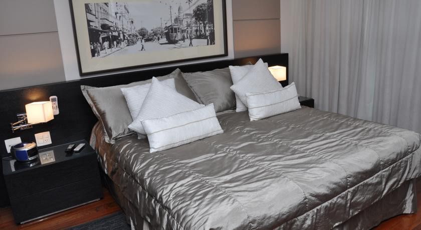 Constantino Hotel E Eventos Juiz de Fora Exterior photo A bed with a duvet
